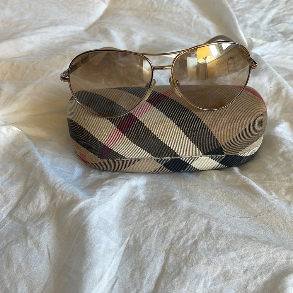 Authentic Burberry Aviator Sunglasses. Minimal signs of wear. Comes with case.